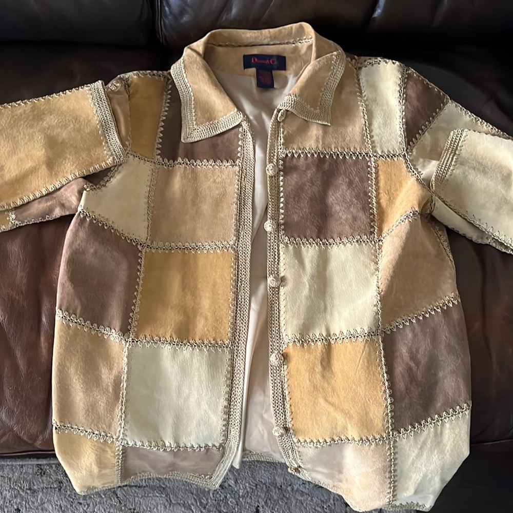 Denim and Co patchwork jacket. 100% leather lining and 100% polyester.